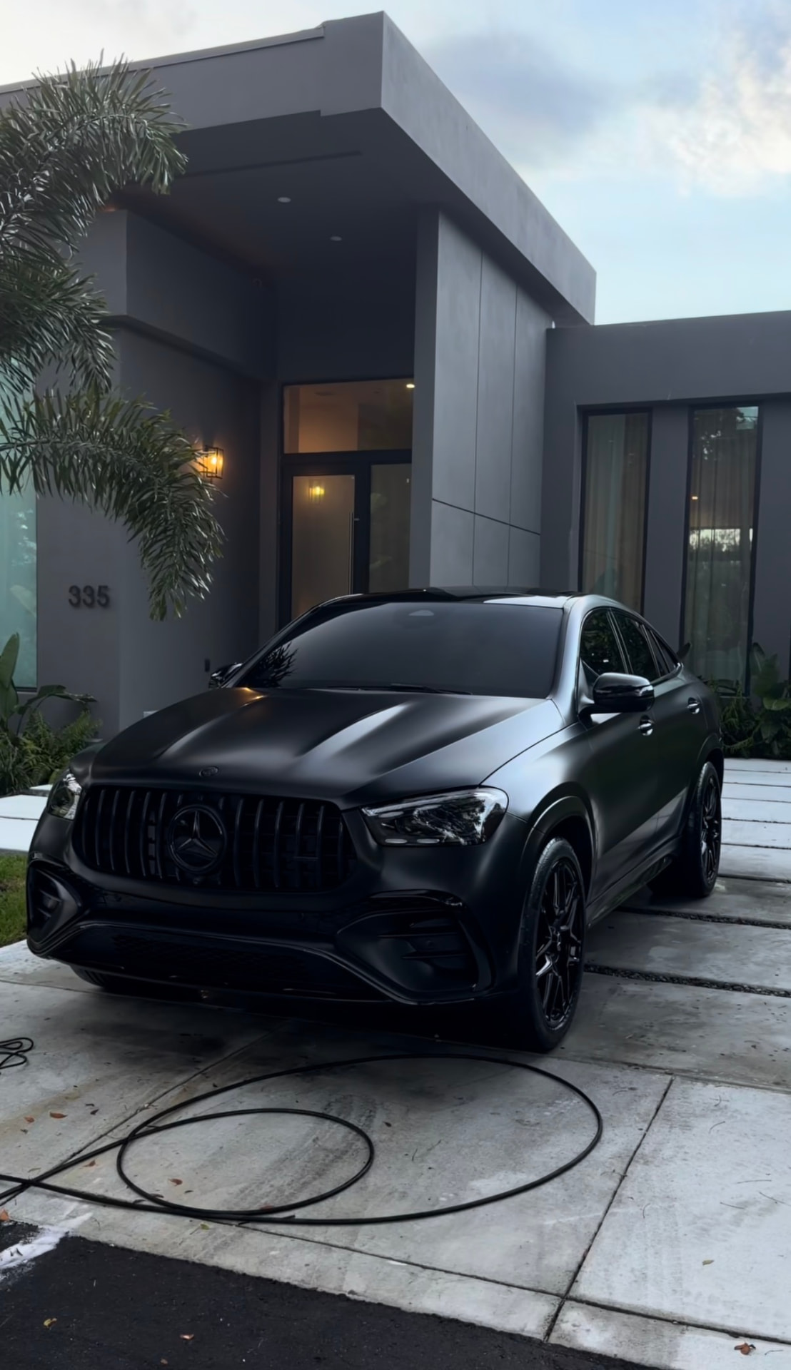 Matte black SUV detailed with a decontamination wash and trim restoration
